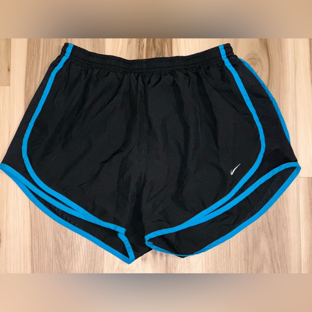 Black and blue dry tempo Nike women’s shorts. Size large